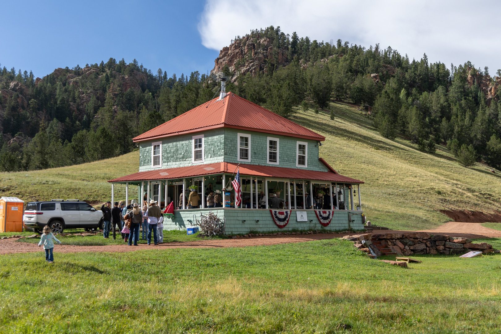 The Elk Glade lodge from the meadow, below the rock outcrop