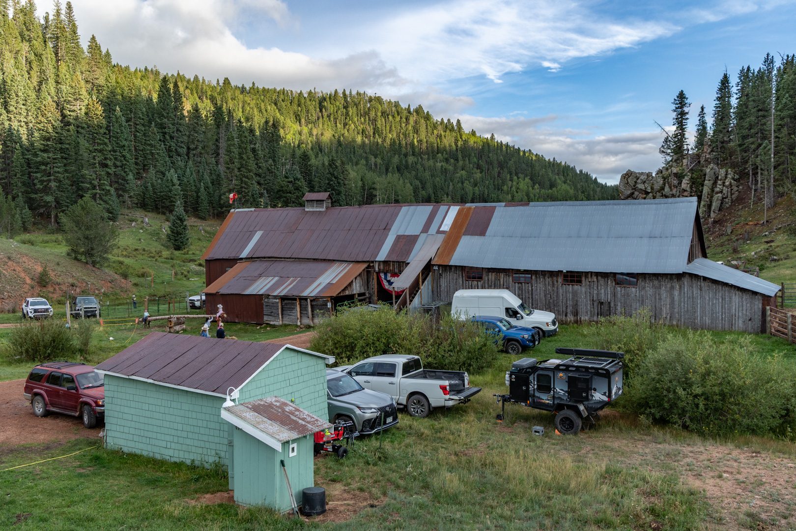 Old barns and the bunkhouse in the valley at Elk Glade