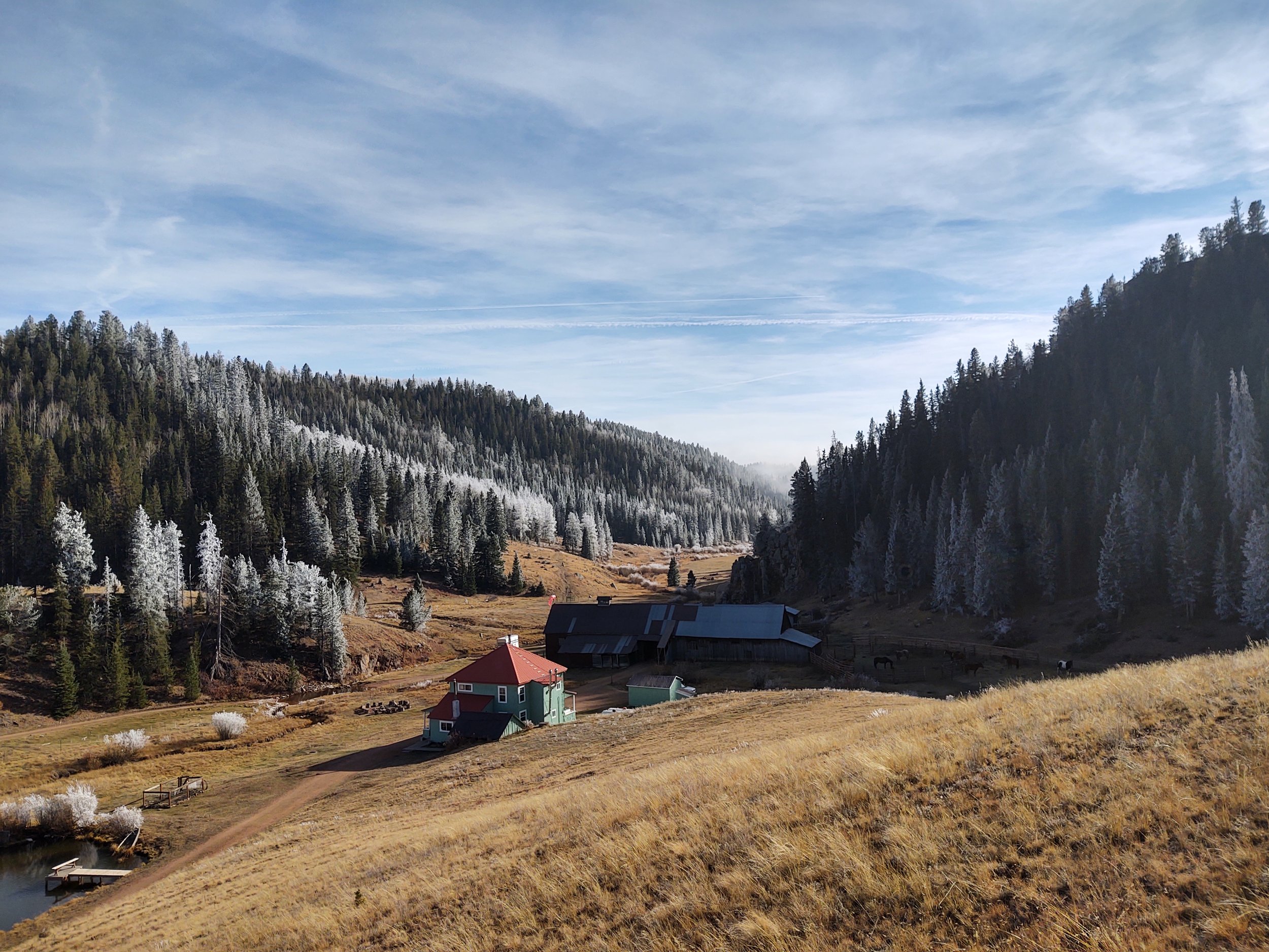 Frost on the valley floor and the ranch buildings along the creek